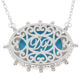Elegant Oval Blue Turquoise Sterling Silver Necklace with intricate filigree design.